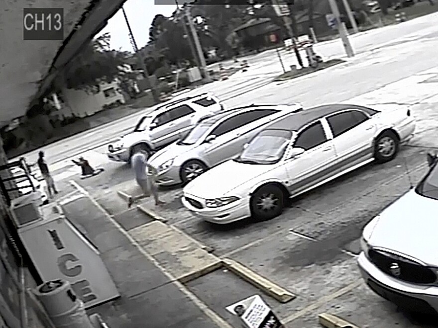 This image taken from surveillance video released by the Pinellas County Sheriff's Office, shows Markeis McGlockton (far left) and Michael Drejka involved in an altercation in a convenience store parking lot in Clearwater, Fla., last week.