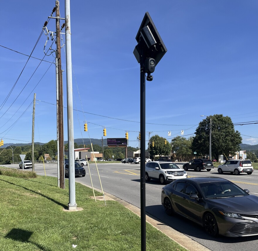 An automatic license plate reader looks over westbound traffic on Tunnel Road near Asheville Mall in east Asheville.