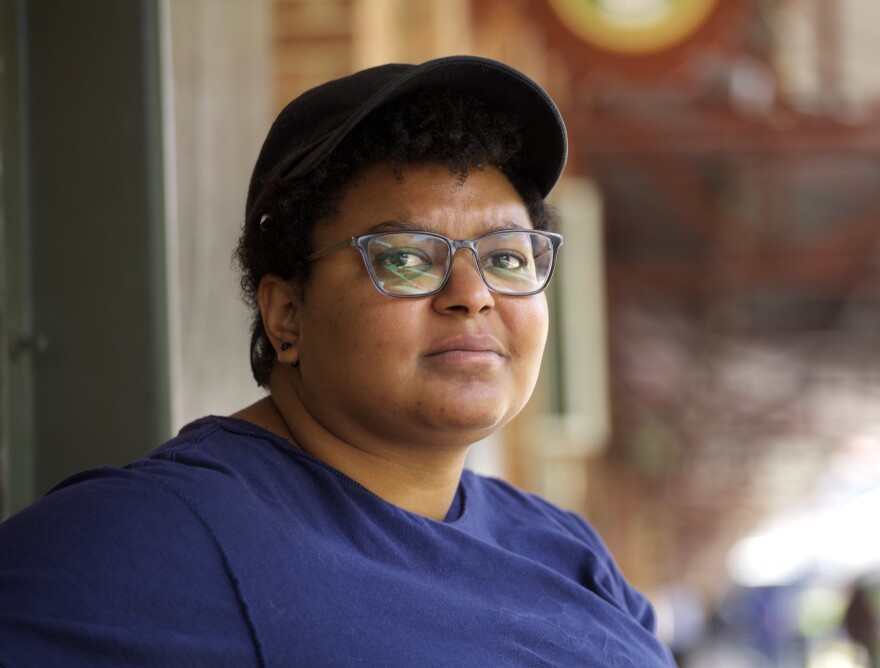 Maya Little, a doctoral student in history at UNC, faces criminal charges for defacing the Confederate monument Silent Sam, which was recently toppled by demonstrators.