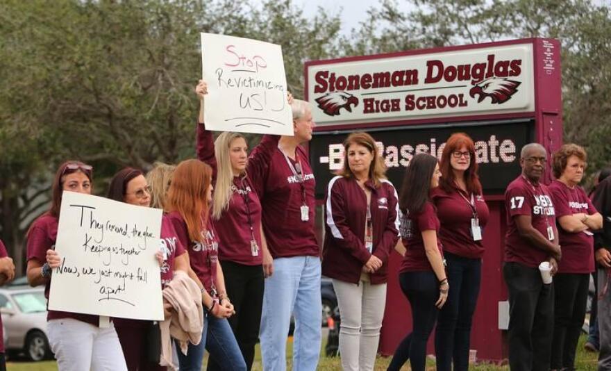 Marjory Stoneman Douglas teachers and staff protest outside of the school, Nov. 27, 2018.