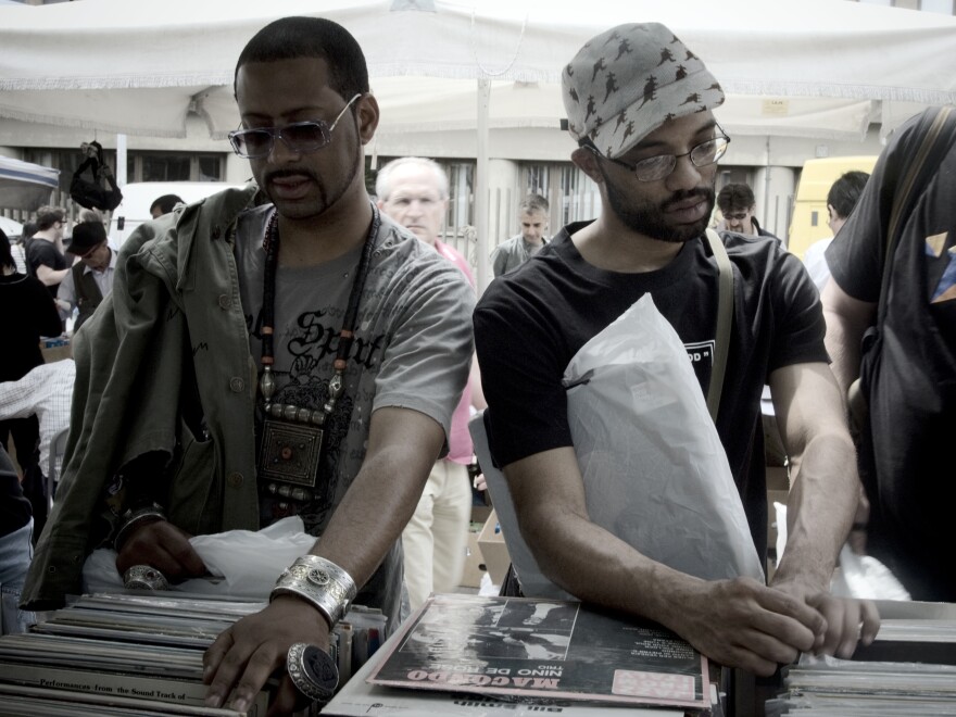 Madlib, left, and his colleague, J-Rocc, digging for records in 2009.