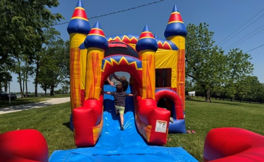Children enjoy playing at the farm