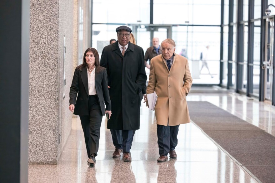 Ex-ComEd lobbyist John Hooker (left) leaves the Dirksen Federal Courthouse after being found guilty of bribery conspiracy.