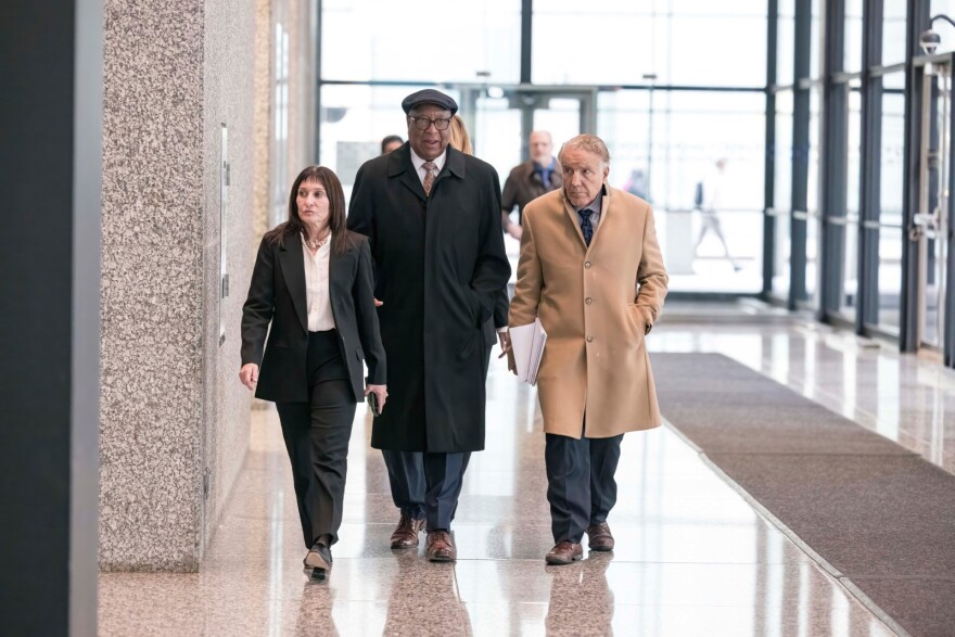 Ex-ComEd lobbyist John Hooker (left) leaves the Dirksen Federal Courthouse after being found guilty of bribery conspiracy. 