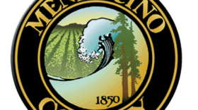 A logo featuring the words "Mendocino County," the year 1850, and images of redwood trees, crashing waves, and vineyards.