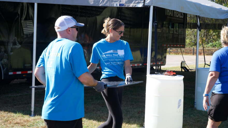 Volunteers piece together the Wall That Heals at USI, Oct. 28, 2026
