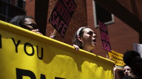 Abortion rights activists on Thursday gathered near the Gateway Arch to protest the potential closure of Missouri's only abortion provider. They marched to the Wainwright State Office Building and decried the state's efforts to limit access to abortion.