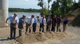 Governor Steve Beshear and Congressman Ed Whitfield (center) help state and local representatives break ground at the bridge site.