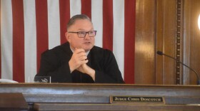 Tazewell County Circuit Court Judge Chris Doscotch presides over a civil case filed against Aaron Rossi and Reditus Labs in Pekin on April 14, 2022.