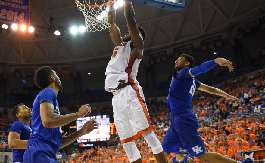 Florida’s John Egbunu (15) goes up for a two-handed slam in the second half. Egbunu lead the Gators in scoring with 27 points.(Greenberry Taylor/WUFT News)