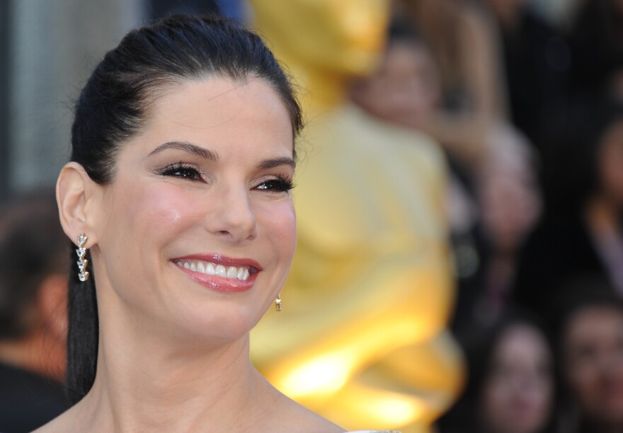 This is Sandra Bullock at the 2012 Oscars. Sunday, she's watching the Super Bowl.