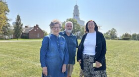 From left, Nauvoo residents Karen Ihrig, John McCarty, and Janet Hill stand at the site of a proposed Nauvoo Temple Visitor Center, with the temple in the background. They say no one in town is opposed to the location, but some are concerned about traffic congestion and public safety.