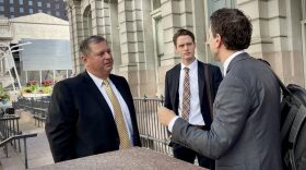 St. Louis attorney Eric Walter, left, speaks with fellow attorneys outside the Missouri Court of Appeals office in downtown St. Louis in October 2024 (Rebecca Rivas/Missouri Independent).