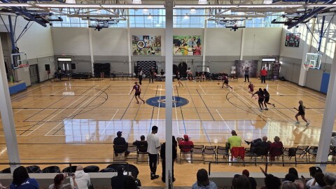 Students face off during the second annual “Business of Basketball” event at Second Ward High School Gymnasium.
