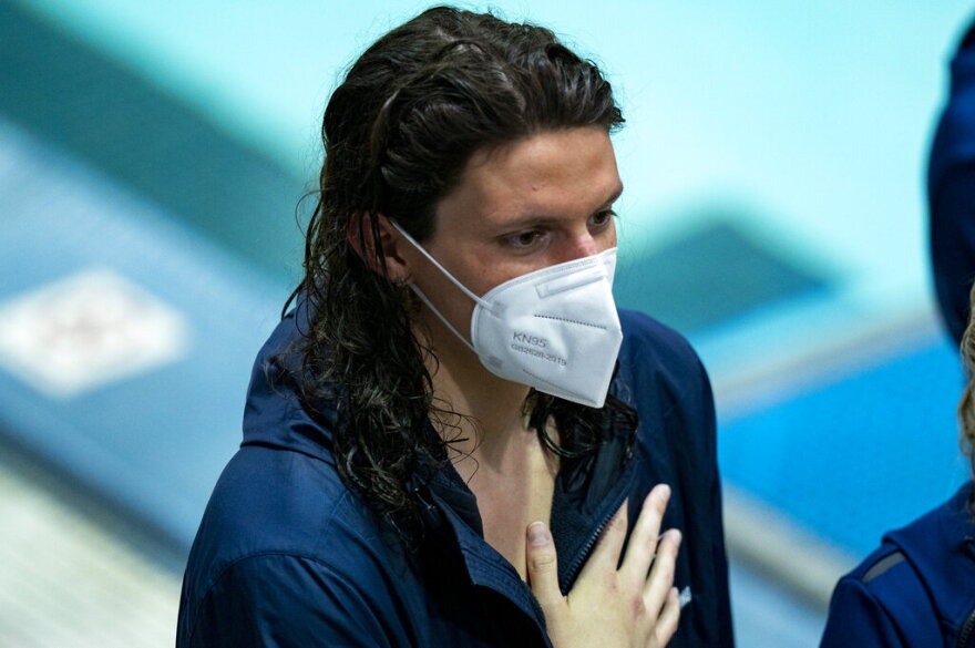 Pennsylvania's Lia Thomas is shown during the playing of the national anthem before a swim meet, Saturday, Jan. 8, 2022, in Philadelphia. The NCAA has adopted a sport-by-sport approach for transgender athletes, bringing the organization in line with the U.S. and International Olympic Committees. NCAA rules on transgender athletes returned to the forefront when Penn swimmer Lia Thomas started smashing records this year.(AP Photo/Chris Szagola)