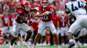 Indiana quarterback Josh Hoover (10) hands the ball off to running back Lee Beebe Jr. (29) during the first half an NCAA college football game against Howard, Saturday, Sept. 12, 2026, in Bloomington.
