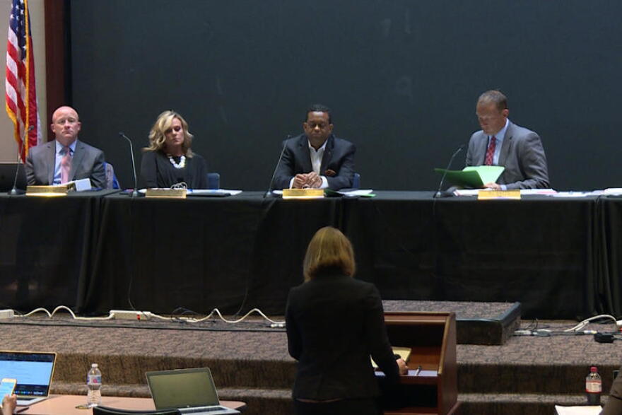 Indiana State Board of Education members ask questions of state director of assessment Charity Flores after seeing the state's first round of ILEARN scores at a meeting September 2019.