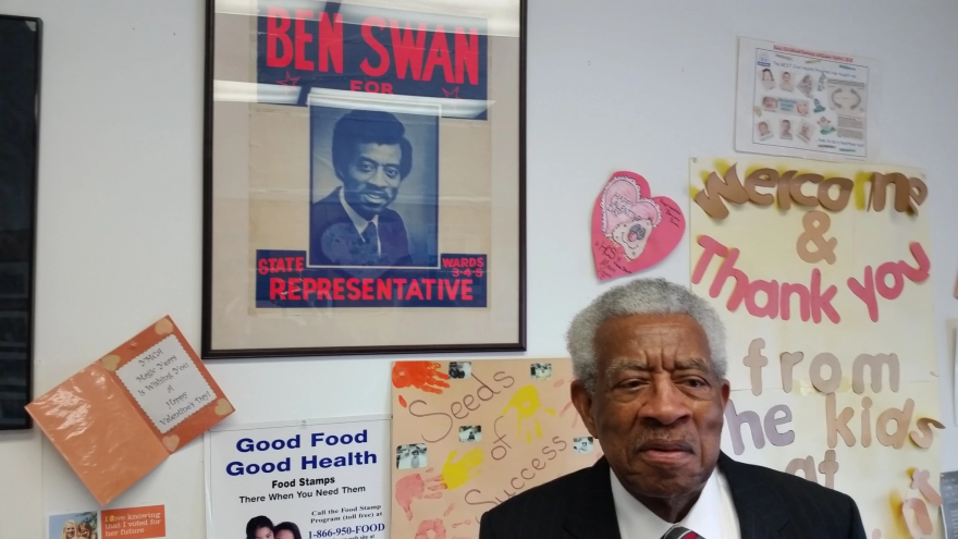 FILE - Benjamin Swan, standing by a framed campaign flyer in 2016. Swan represented Springfield as the Massachusetts State House for 11 terms.
