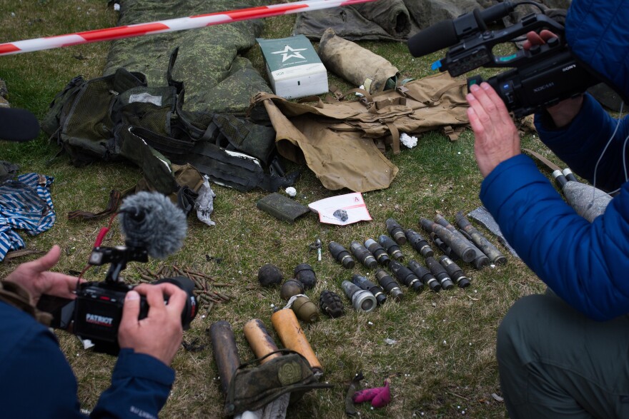 Ukrainian authorities have organized tours for foreign journalists to see the damage done to Bucha. Officials say the suburb is still riddled with mines and other explosives left by the Russians.