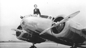 Amelia Earhart on the nose of her Lockheed Electra, March 12, 1937.