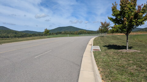 A road and gate at the entrance to the Wood Haven Technology Park in Roanoke County on Sept. 30, 2026.