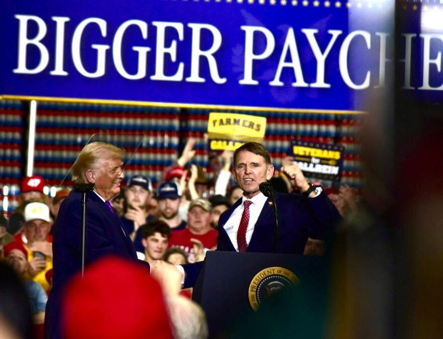 President Donald Trump brings Republican candidate Ed Gallrein on stage in northern Kentucky on Wednesday March 11, 2025. Gallrein is running against GOP Rep. Thomas Massie in the May primary.