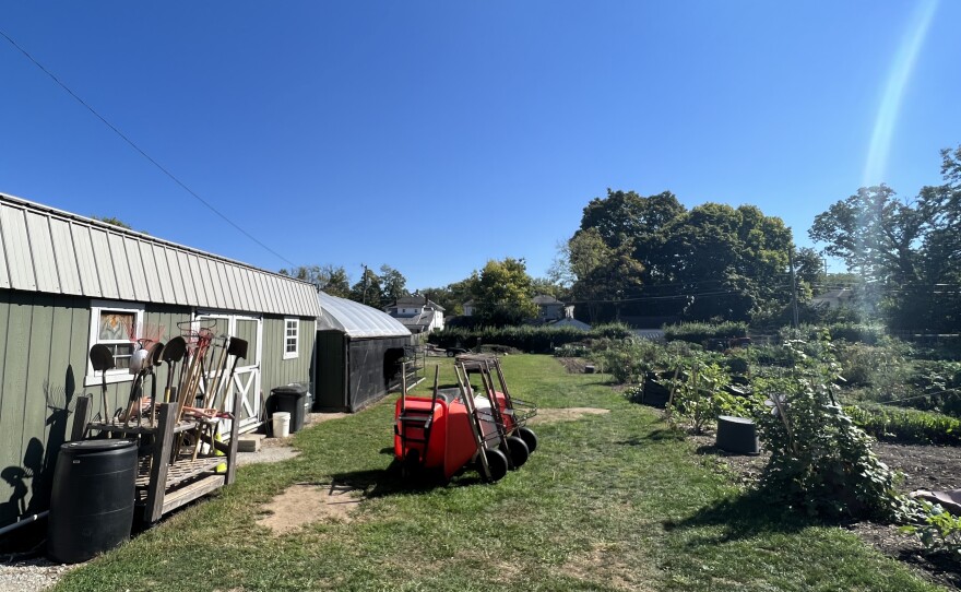 Multiple photos of the Jefferson Street Oasis Community Garden's amenities and examples of current plots