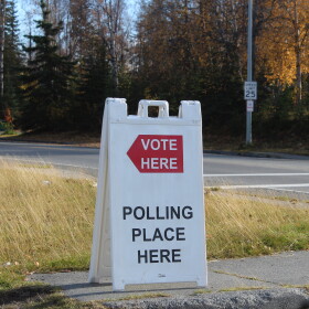A sandwich board sign marks the entrance to a polling place on Tuesday, Oct. 7, 2025 in Soldotna, Alaska.