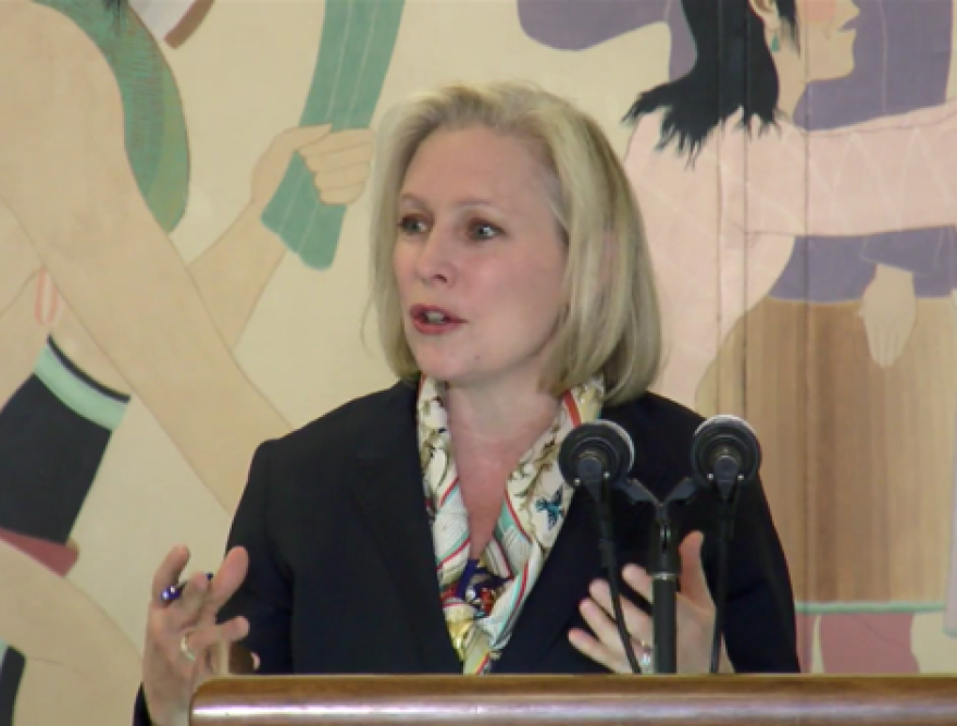 U.S. Sen. Kirsten Gillibrand of New York addresses listeners from a podium. 