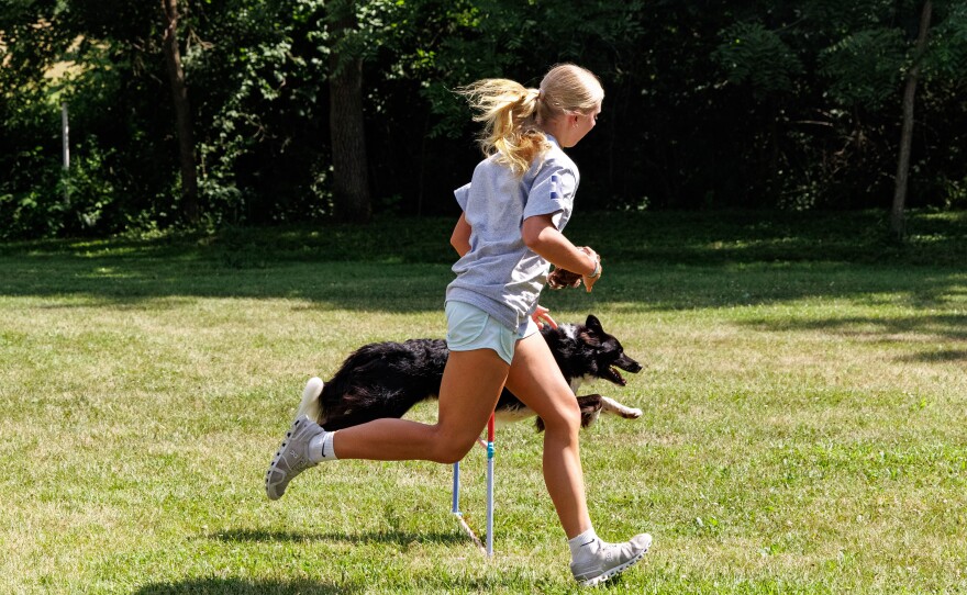 Evelyn also competes with the family dog, Daisy, in dog agility.