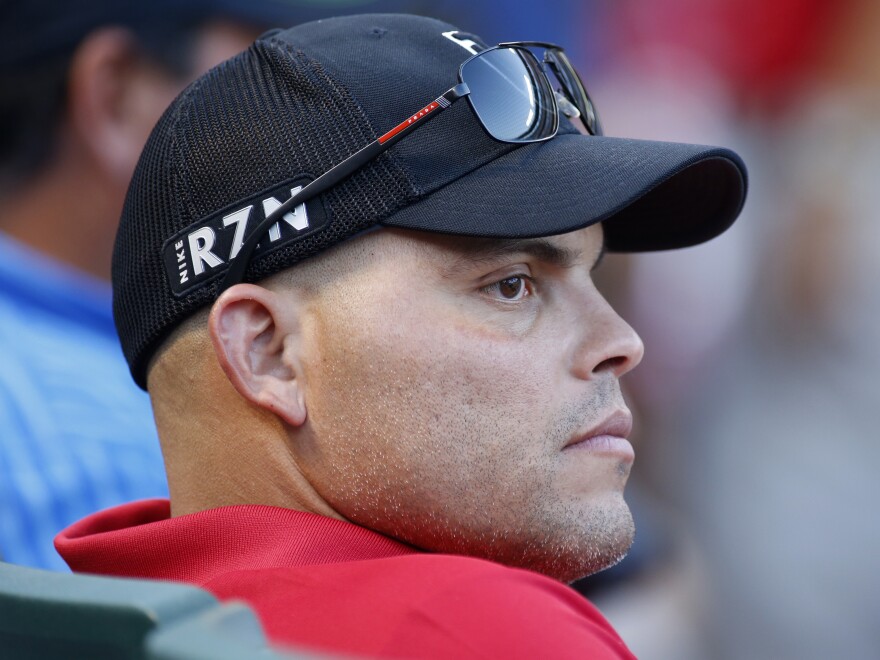 Ivan "Pudge" Rodriguez watches a Texas Rangers baseball game in 2014. Regarded as one of the best catchers in the game, Rodriguez was elected to the Hall of Fame his first time on the ballot.