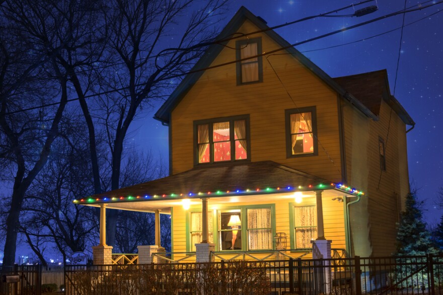  "A Christmas Story" house is lit up at night.  [Juli Scalzi / Shutterstock]