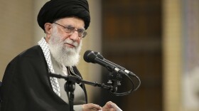 In this picture released by the official website of the office of the Iranian supreme leader, Supreme Leader Ayatollah Ali Khamenei speaks to a group of residents of the city of Qom, in Tehran, Iran, Wednesday, Jan. 8, 2020. Ayatollah Khamenei said "we slapped them (Americans) on the face last night" with a missile strike "but military action is not enough." (Office of the Iranian Supreme Leader via AP)