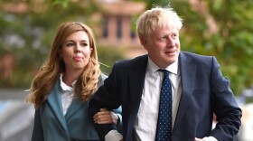 British Prime Minister Boris Johnson and his girlfriend Carrie Symonds at the Conservative Party Conference in 2019. The couple are engaged and expecting their first child.