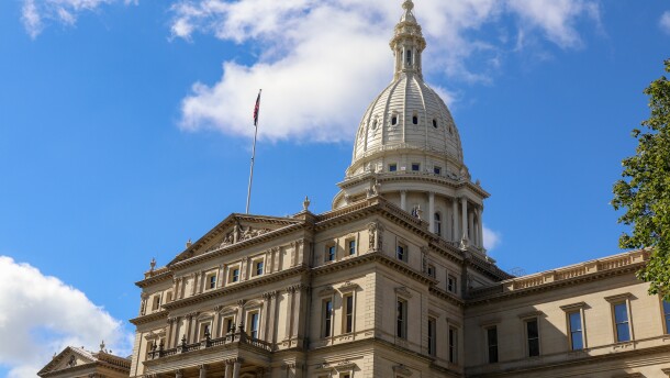 Michigan Capitol building in Lansing on a summer day.
