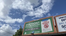 A billboard at Broad and Orleans advertising the right to counsel program.