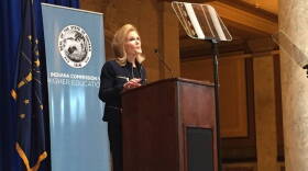 Commissioner for Higher Education Teresa Lubbers led a meeting in 2015 discussing how Indiana educators can get more college education to teach dual credit courses