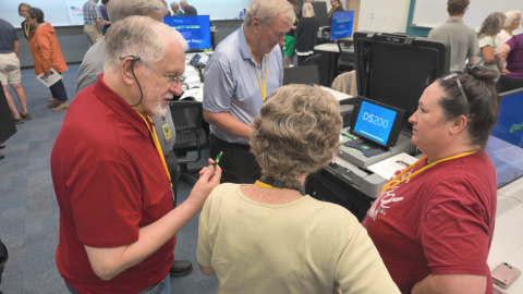 Election judges in training get comfortable with Greene County's election equipment during a training in July 2026.