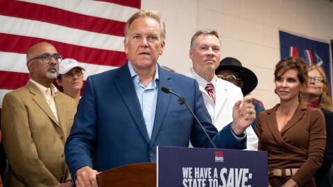 Michigan U.S. Senate candidate Mike Rogers speaks to reporters at a campaign office in Taylor, Michigan on Saturday, September 19.