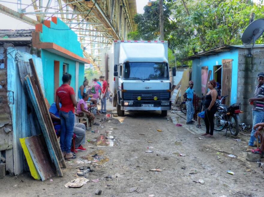 Families wait until space opens in La Nueva Barquita before they can leave their homes.