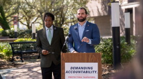 Leon County Commissioners Bill Proctor (left) and Christian Caban announce the findings of a review of the local fire services fee