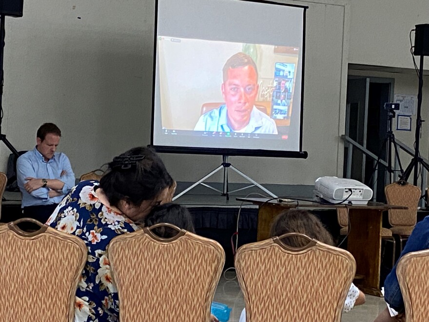 Navy Ensign Koda Freeman speaks at a town hall on Oʻahu on March 28, 2023.