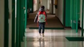  A student walks down the hallway at Cactus Elementary School in Cactus in 2020. 