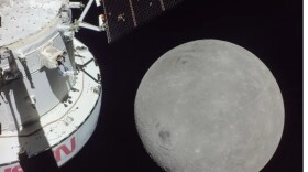 A portion of the Moon looms large just beyond the Orion spacecraft. At its closest point, Orion flew within 80 miles of the lunar surface.