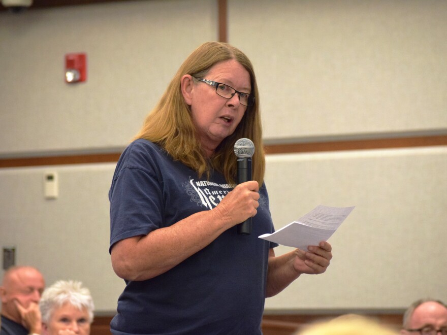 Ward 5 resident Leslie Rard speaks during an August 15 community meeting about Norman's stormwater utility vote.
