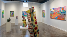 Clay works by Garet Reynek. Paintings by Kevin Kelly.