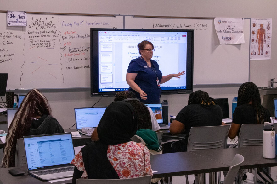 Nursing services instructor Jessica Cochran teaches a lesson on how to study for her class at John Marshall Enterprise High School's new college and career center.