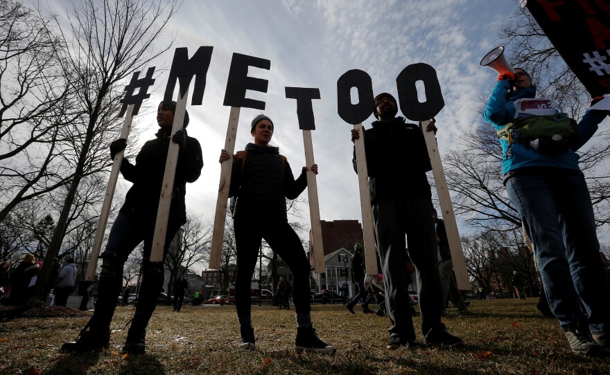 Demonstrators spell out "#METOO" during the local second annual Women's March in Cambridge, Massachusetts.