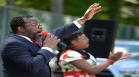 The Rev. Ronald Holmes leads a drive-up church service at Gethsemane Missionary Baptist Church in Bloomfield.