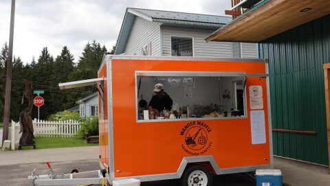 Prussack inside the Wander Waffle truck on Sing Lee Alley on Jul 12, 2026